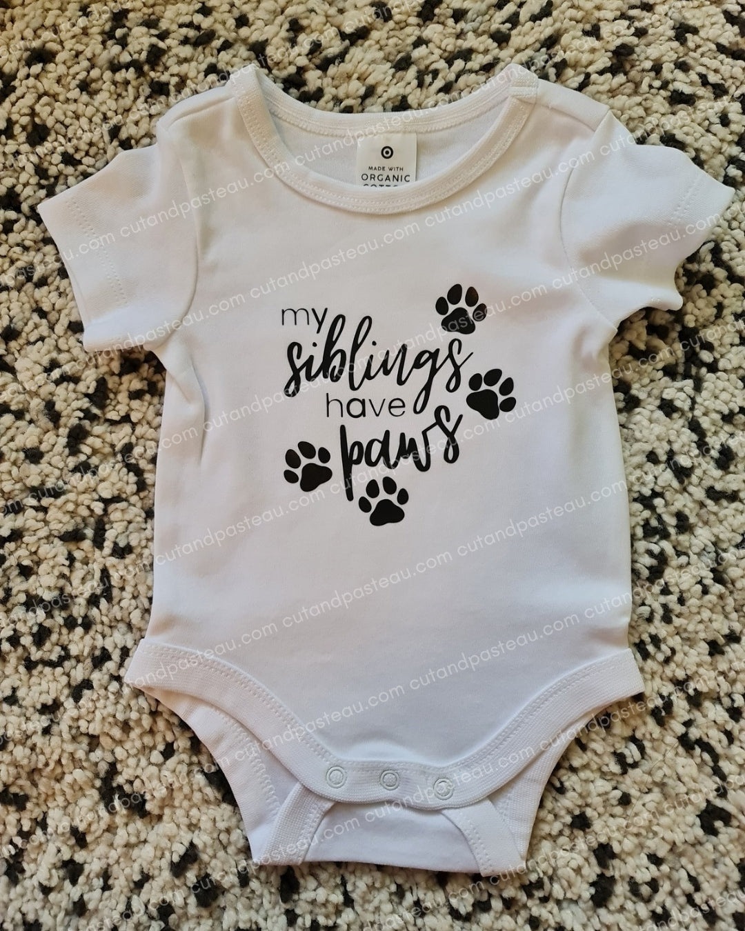 My Siblings have Paws Baby Bodysuit